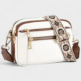 Olivia - Bolso bandolera con correa estampada