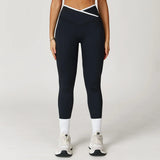 Leggings con ribete blanco