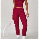 Conjunto deportivo con leggings y lazado en cuello
