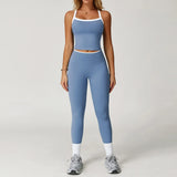 Conjunto deportivo con leggings y ribete blanco