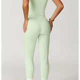 Conjunto deportivo con leggings y ribete blanco