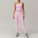 Conjunto deportivo de dos piezas con top asimétrico