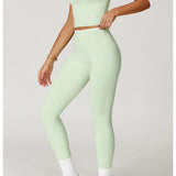 Conjunto deportivo con leggings y ribete blanco