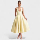 Effie – Vestido Midi Texturizado con Escote Halter que resalta tu feminidad