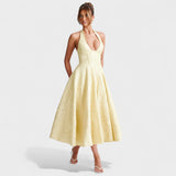 Effie – Vestido Midi Texturizado con Escote Halter que resalta tu feminidad