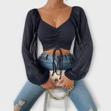 Jacqueline – Blusa versátil que destaca tu estilo en la noche