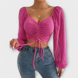 Jacqueline – Blusa versátil que destaca tu estilo en la noche
