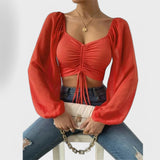 Jacqueline – Blusa versátil que destaca tu estilo en la noche